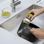 Soap-Dispensing Dish Scrub Brush